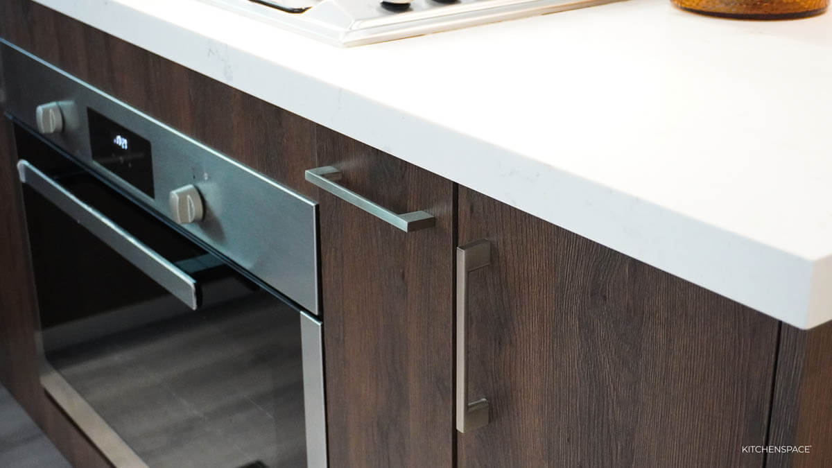 Walnut Kitchen with Geometric Backsplash